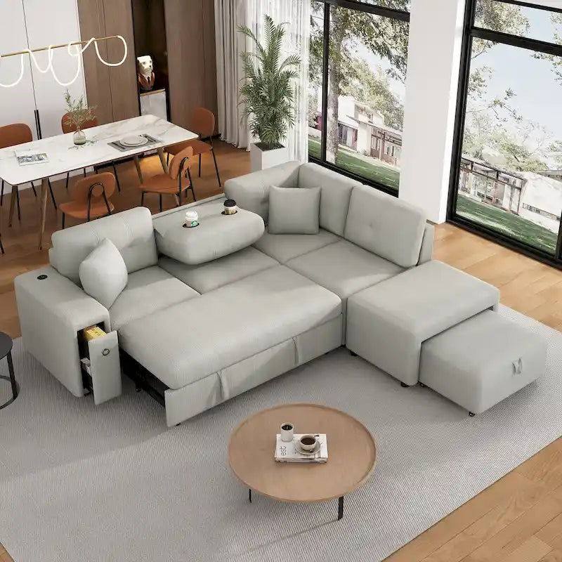 Divano componibile a L beige/grigio con letto estraibile, porte USB e pouf, 3 posti