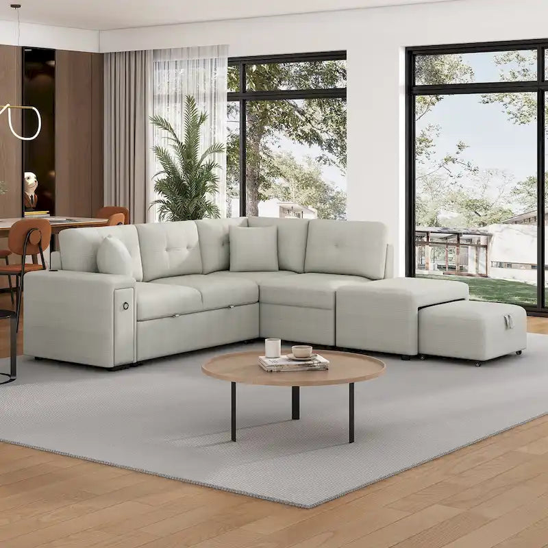 Divano componibile a L beige/grigio con letto estraibile, porte USB e pouf, 3 posti