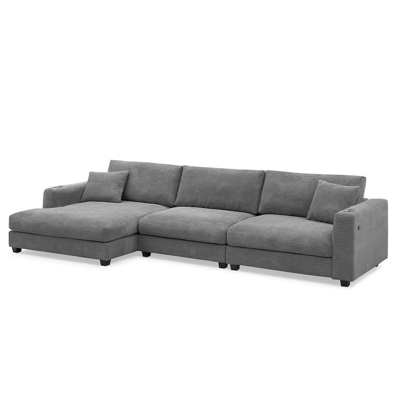 Divano componibile a L in velluto a coste grigio con chaise longue, portabicchieri e porte USB, 3-4 posti a sedere