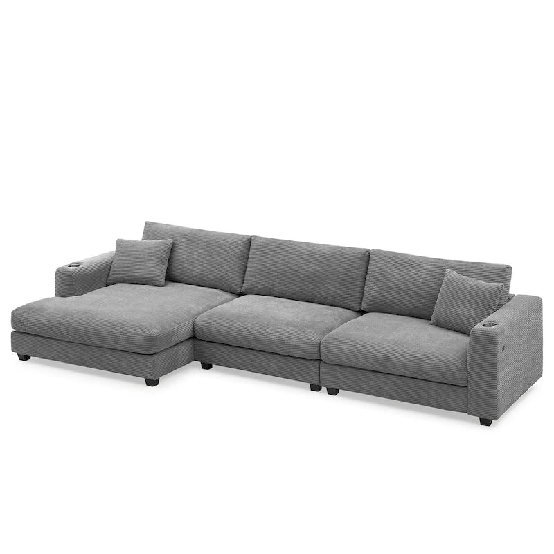 Divano componibile a L in velluto a coste grigio con chaise longue, portabicchieri e porte USB, 3-4 posti a sedere