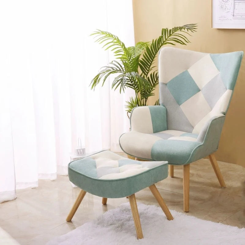Poltrona accentata in lino blu/rosa/multicolore con pouf, seduta singola, poltrona con schienale alto curvo