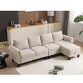 Divano componibile a L in velluto beige con pouf contenitore – 4 posti